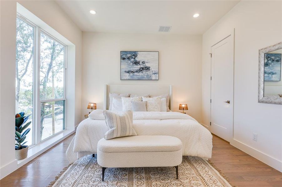 Bedroom featuring hardwood / wood-style floors