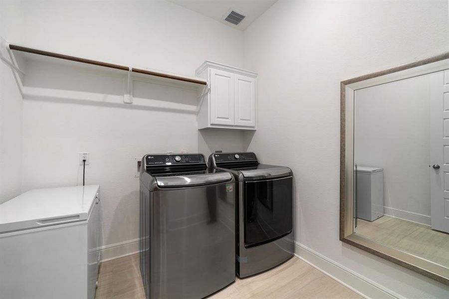 Utility Room with space to put extra refrigerator\cooler