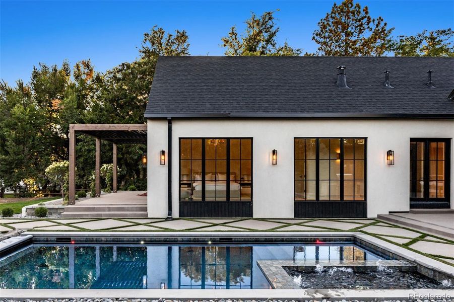 Primary Suite overlooking backyard pool