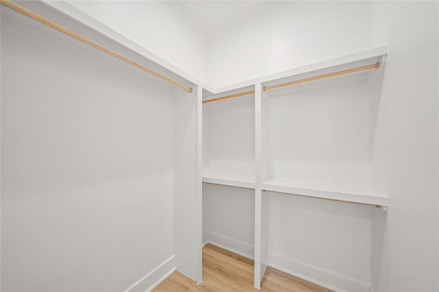 Spacious walk-in closet for the 3rd floor secondary bedroom.