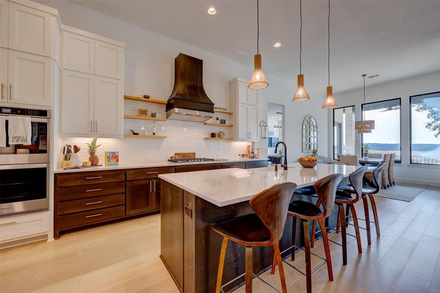 Gorgeous Kitchen with Farmhouse Touches! Dining Area with 4 Picture Windows and Door to Patio