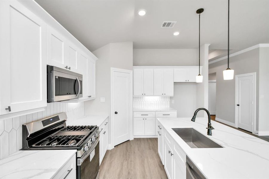 Open concept kitchen with kitchen island