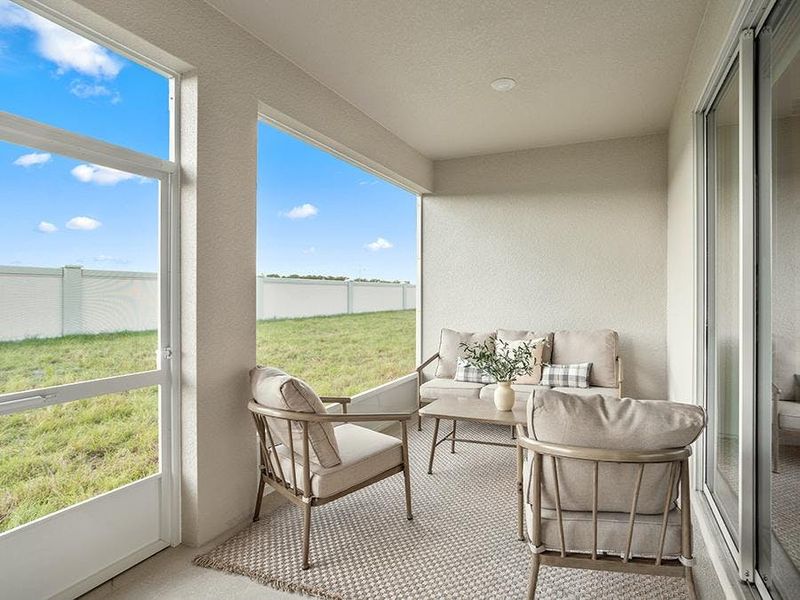 Take in the beautiful fresh air on your spacious covered lanai with optional screen enclosure - Summerlyn ll home plan by Highland Homes