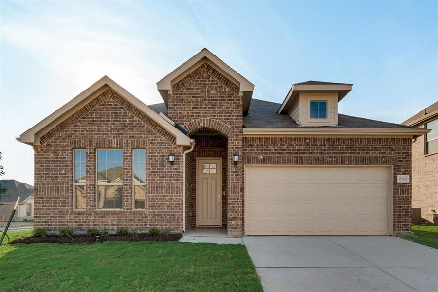 View of front property with a front yard