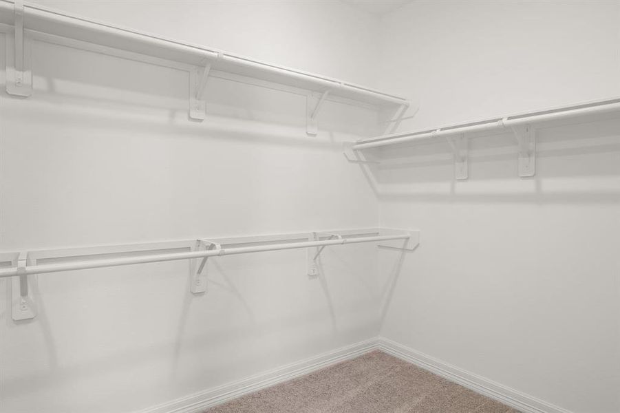 A view of your large primary walk-in Closet