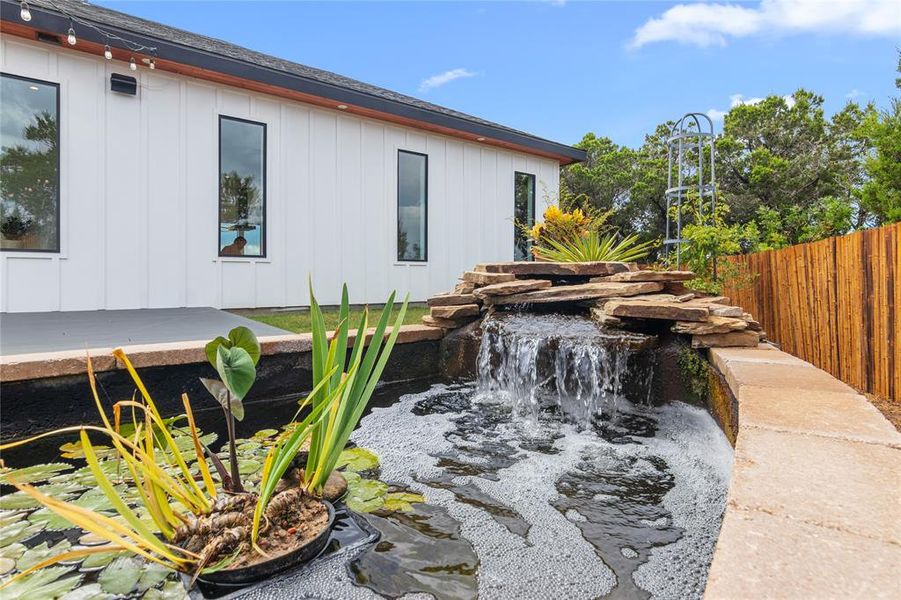 Koi pond with fish. Can be changed if not desired