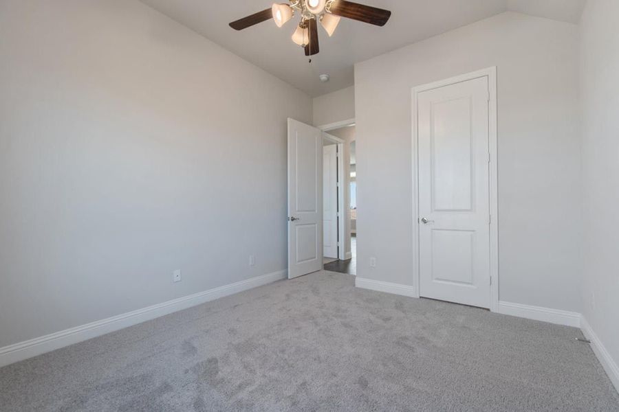 Bedroom | Concept 2406 at Hidden Creek Estates in Van Alstyne, TX by Landsea Homes