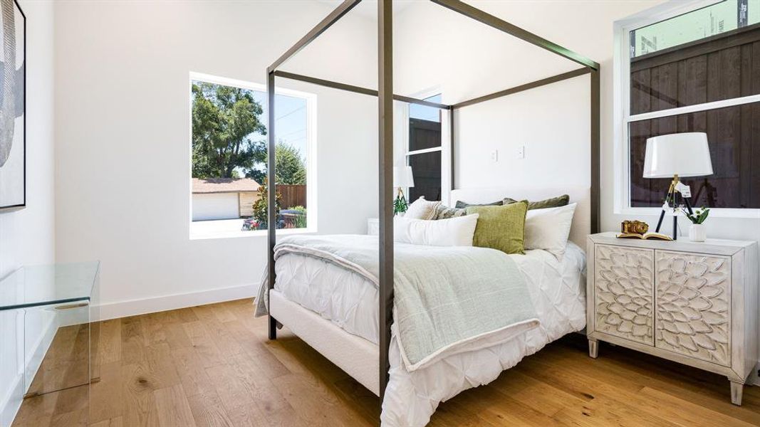 Bedroom featuring hardwood / wood-style floors