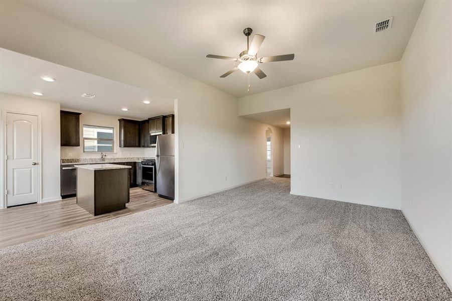 Centrally located in the Blanco plan is the spacious family room that opens to the chef-ready kitchen and dining room.