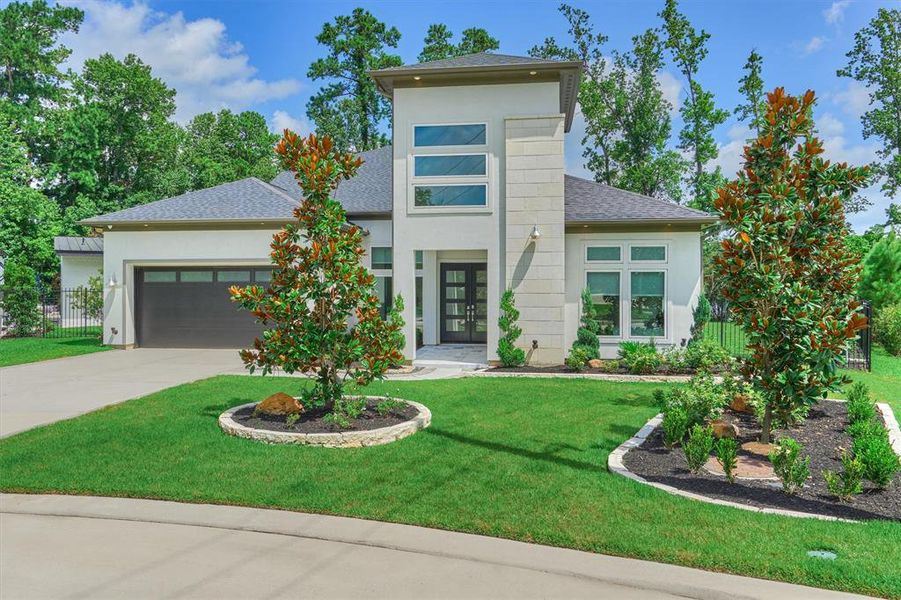 A true, one-of-a-kind custom home on a sprawling corner, cul-de-sac lot, waterfront to expansive pond with $135k in upgrades located in Creekside Park, The Woodlands!