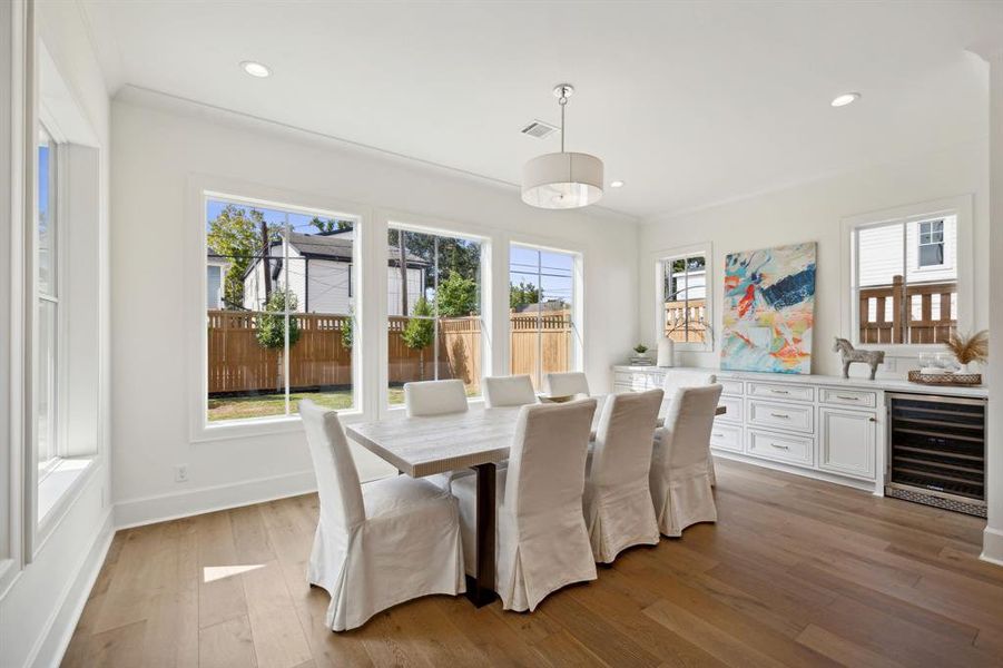 Additional view of dining room and built-in beverage center.