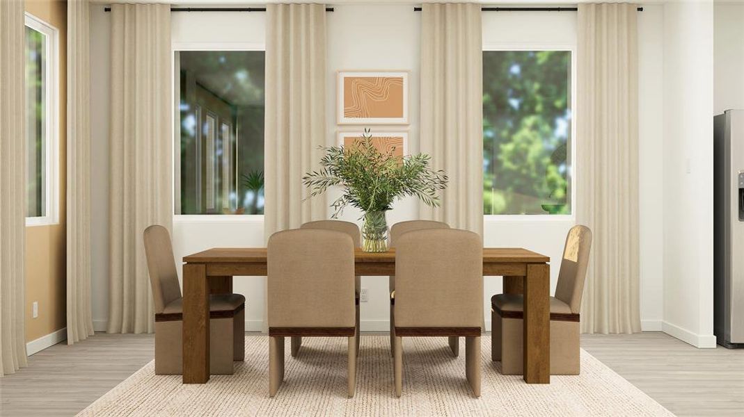 Dining area featuring light hardwood / wood-style floors