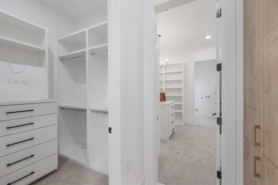 The second primary closet also boasts an impressive amount of space.