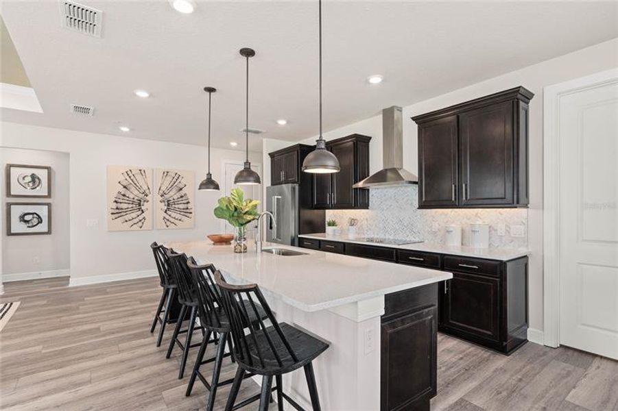 Kitchen. Model Home Design. Pictures are for illustrative purposes only. Elevations, colors and options may vary. Furniture is for model home staging only.