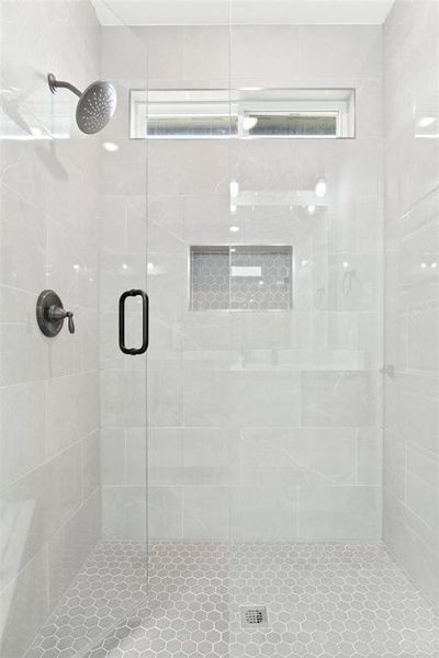 Bathroom featuring an enclosed shower