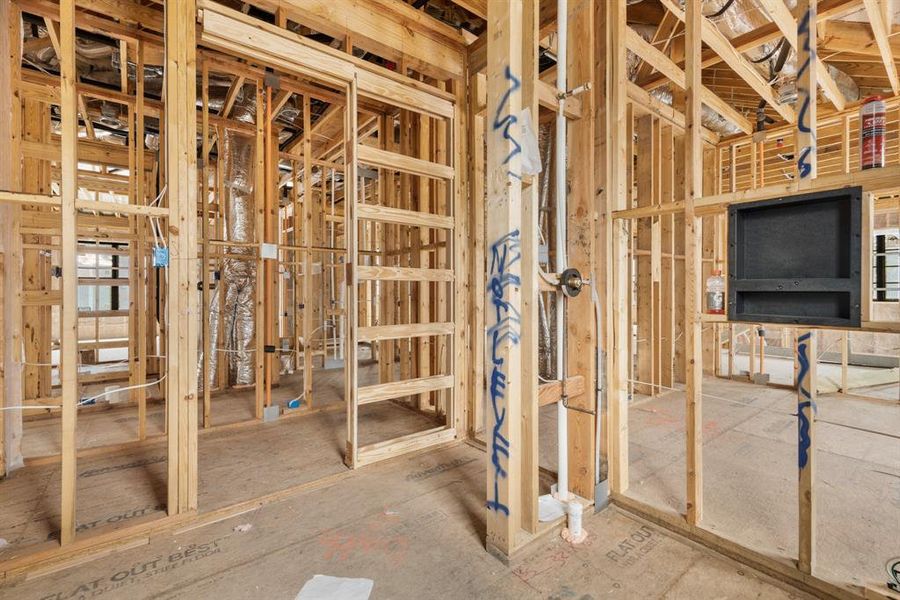 The full bath enjoys plenty of light and attic access!