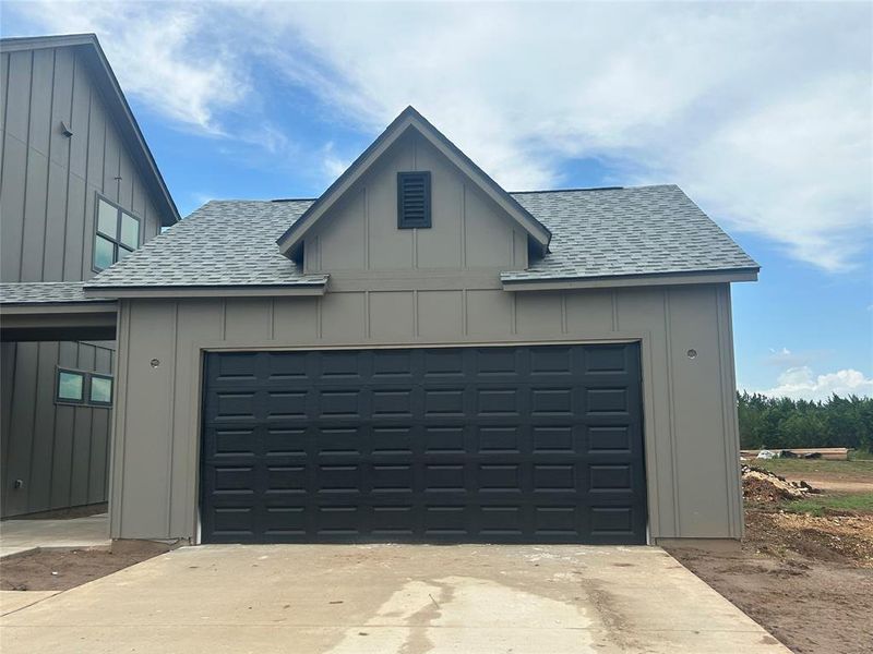 Detached garage holds 3 vehicles. One side is tandem.