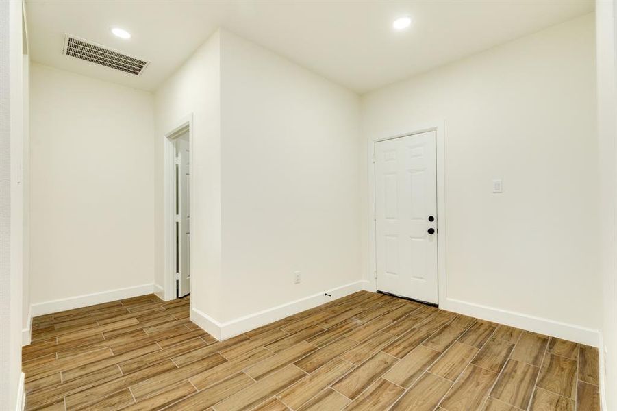 Mud room located off the garage and laundry room