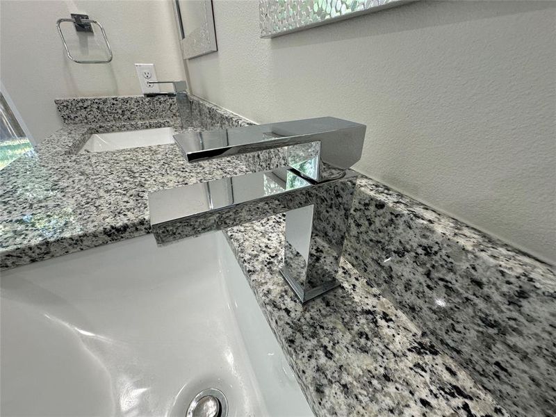 Upgraded stainless steel faucets in bathrooms