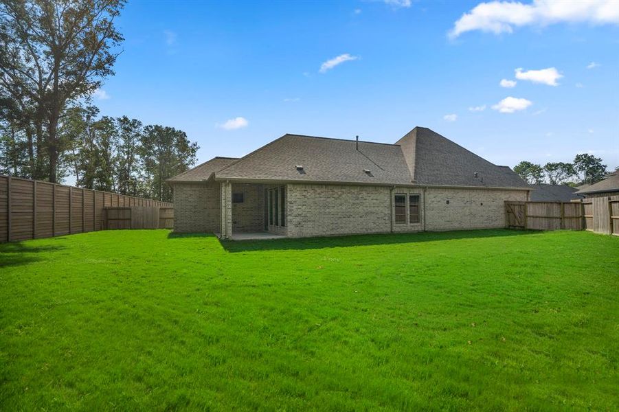 This massive backyard is equipped with french drains