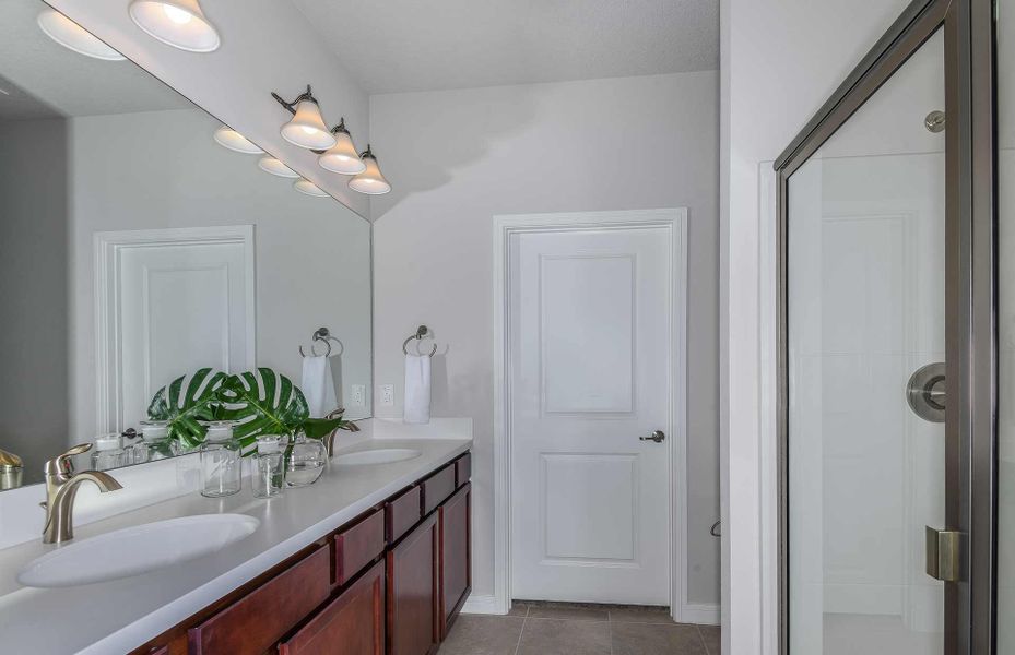 Spacious Owner's Bathroom with standing shower and