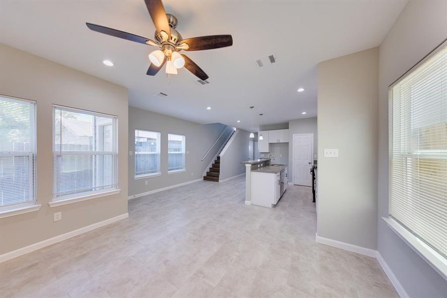 From the entry to the living area, you get a full view of the first floor. The open floor plan is perfect for families with small children, pets, and more. It creates a spacious feel and offers endless possibilities for décor and personalization.