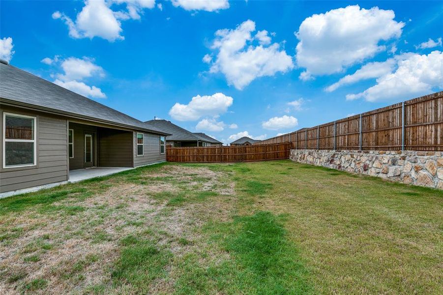 View of yard featuring a patio area