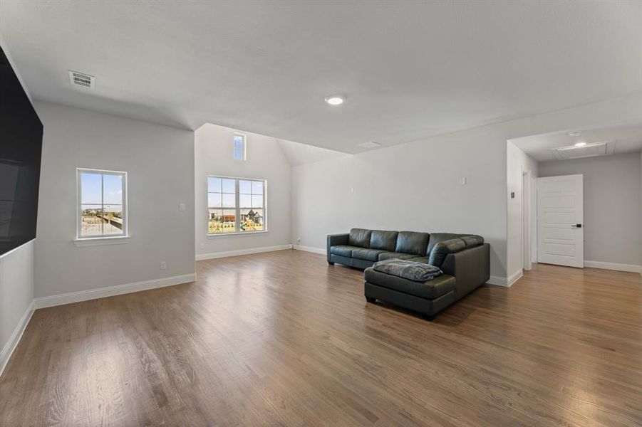 Living room featuring hardwood / wood-style flooring