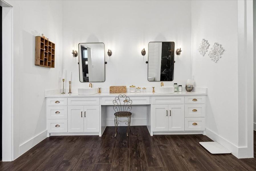 Bathroom featuring vanity and hardwood / wood-style floors