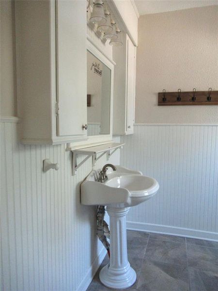 Bathroom with tile patterned flooring