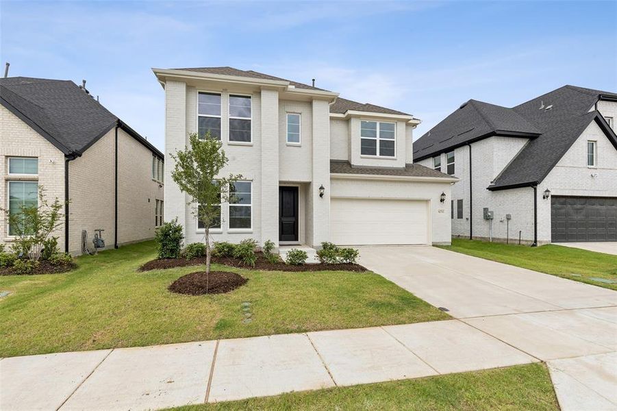 Clean lines paired with contemporary style, this dream home offers great curb appeal!