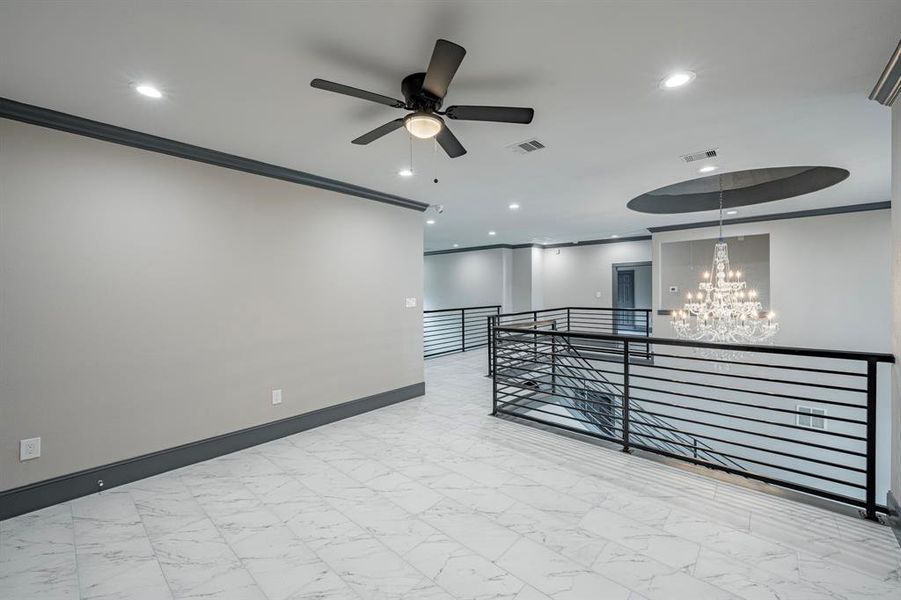 Upstairs Game room showcase the beautiful tile floors