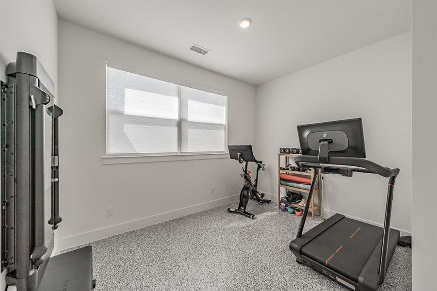 Bonus room with durable epoxy floors that can be used as gym space