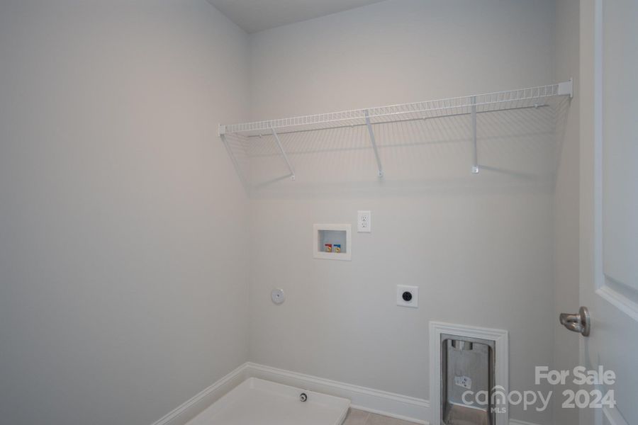 Laundry Room. Photo representation. Colors and options will differ.