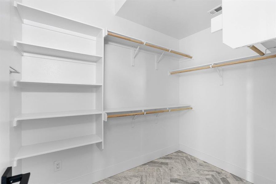 One of two closets in the primary BDRM