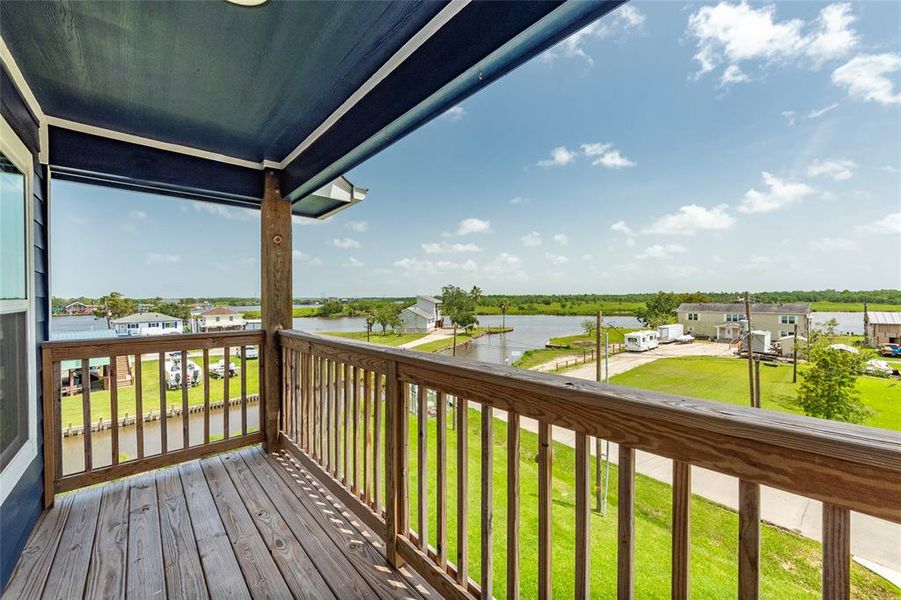 Step out onto the private balcony from the owner's retreat and be captivated by the amazing views! This serene outdoor space offers breathtaking vistas of the water and surrounding landscape, providing the perfect spot to unwind and enjoy the natural beauty that surrounds you.