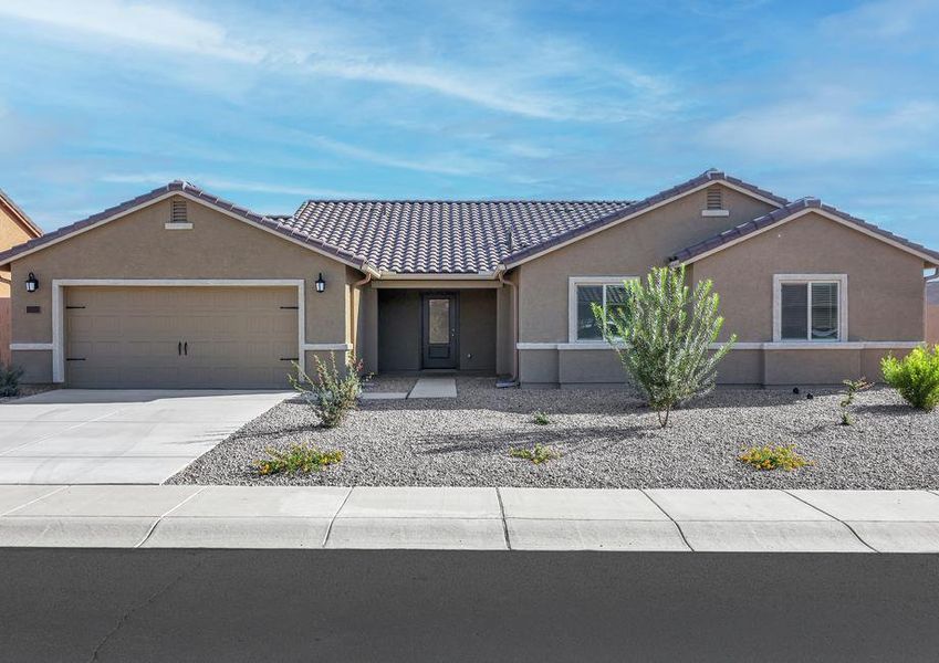 This home has a 2-car garage and gorgeous stone detailing.