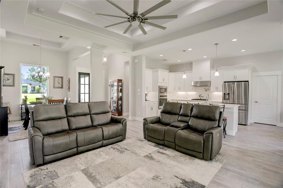 EMBRACE THE LUXURY OF OPEN-PLAN LIVING IN THIS ELEGANTLY DESIGNED SPACE.