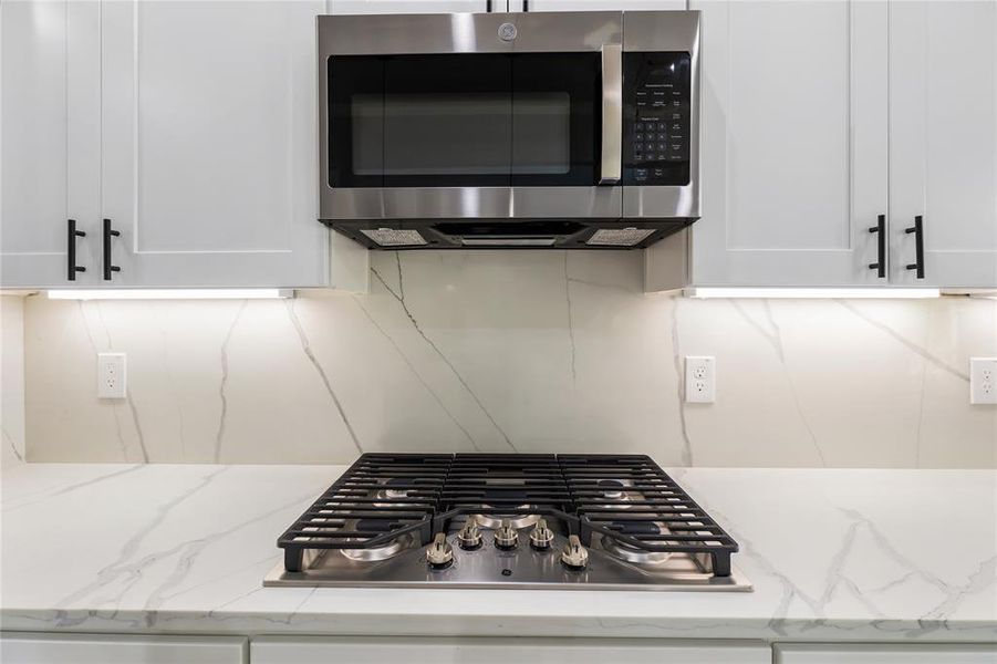 The 5-burner gas cooktop will help your inner chef shine through!