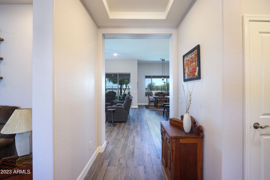 Foyer wood look tile flooring throughout