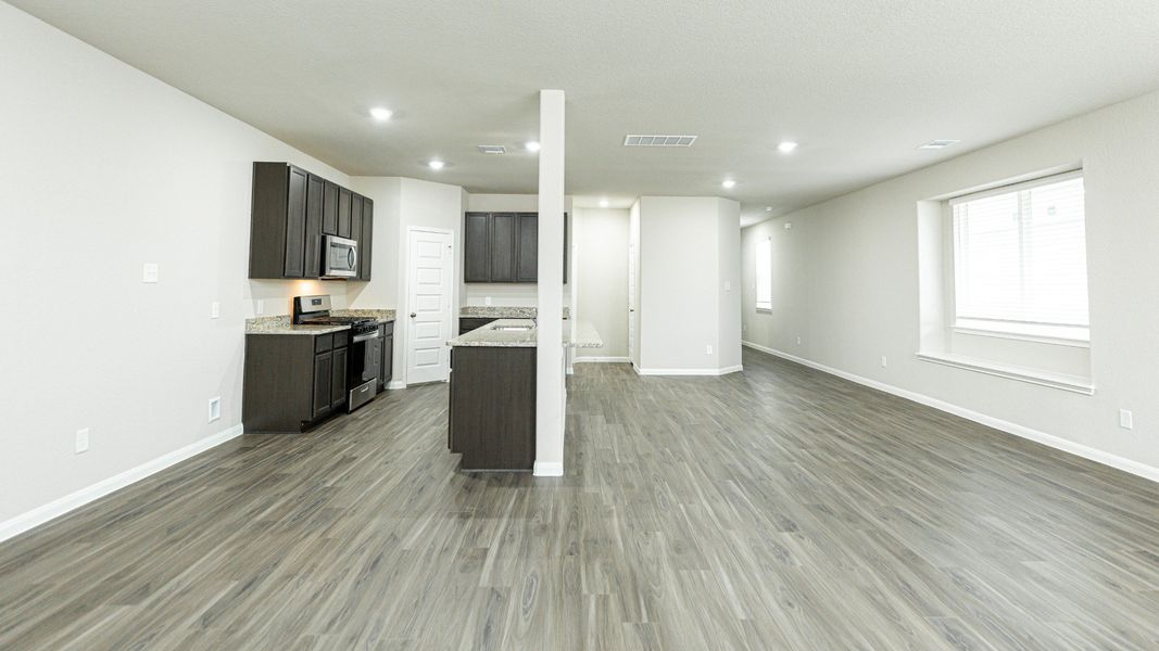 Dining Area to Kitchen and Family Room