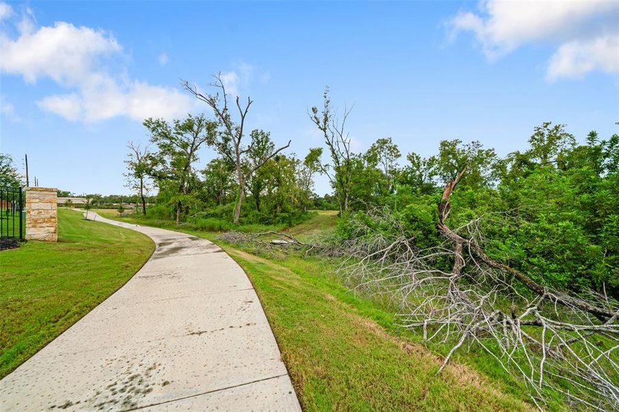 A view of the walking path just down the road from this home!