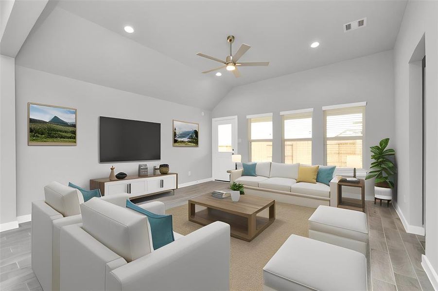 Gather the family and guests together in your lovely living room! Featuring soaring high ceilings, recessed lighting, ceiling fan, custom paint, gorgeous floors, and large windows that provide plenty of natural lighting throughout the day.