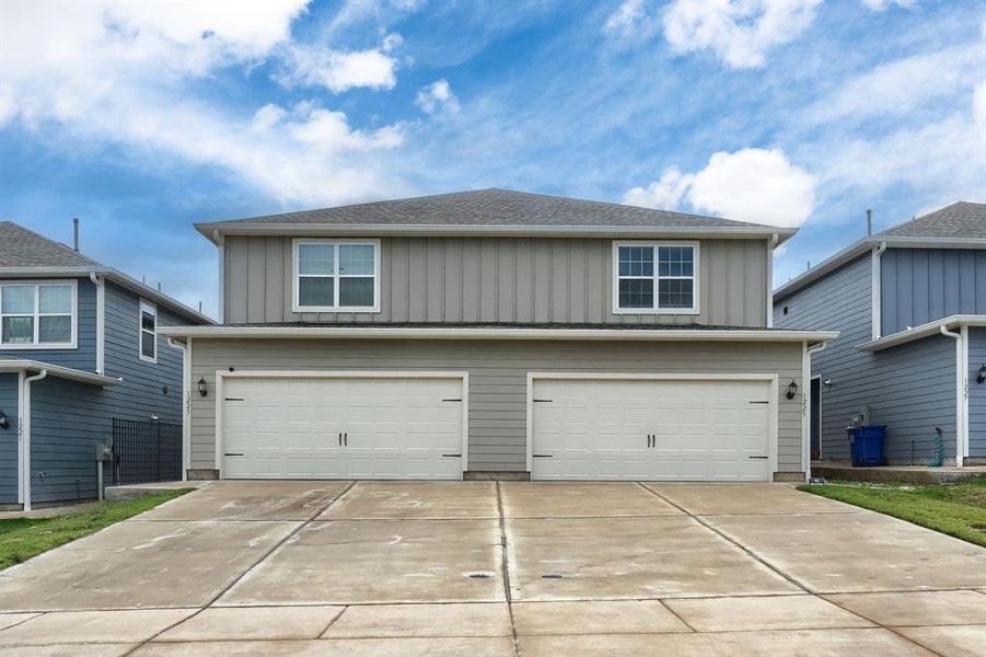 View of front facade with a garage