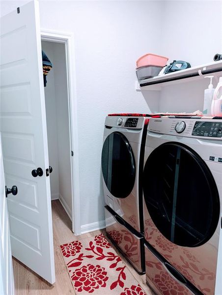 laundry room with closet