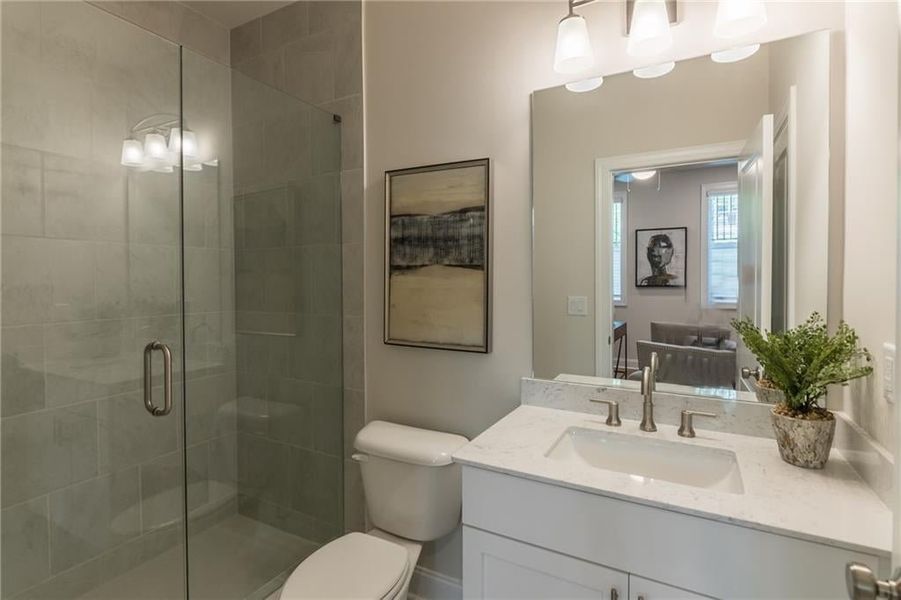 Beautiful secondary bath with soft close doors and drawers! Not acutal home.