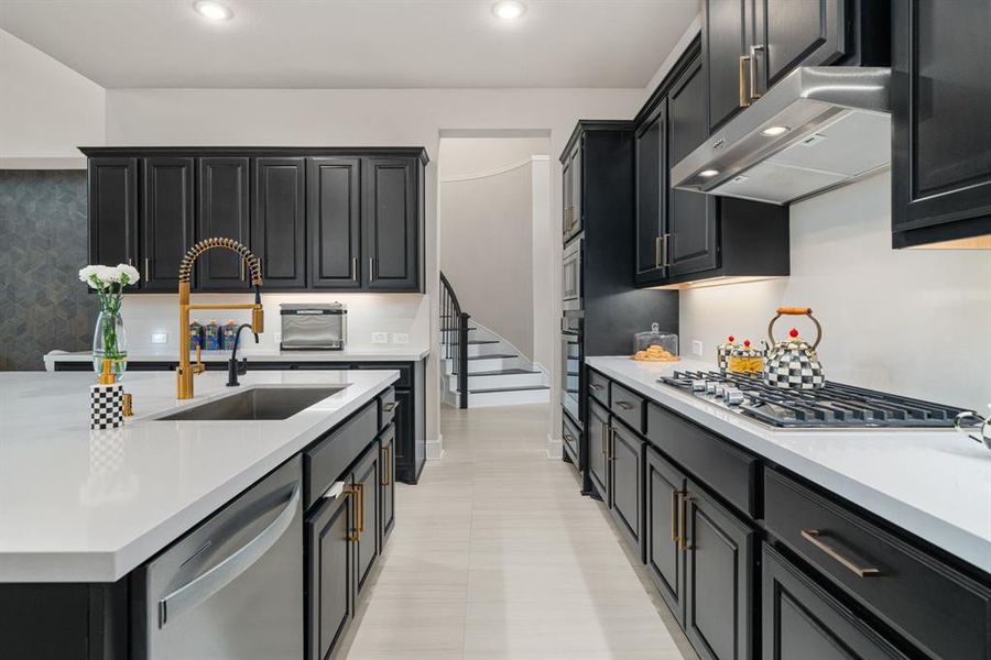 Huge kitchen with quartz countertops