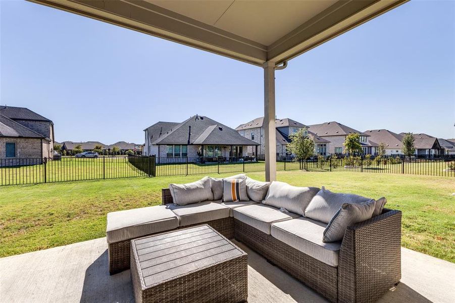 View of covered patio featuring outdoor lounge area