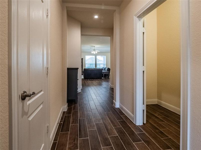 from the from door the tile follow through into the living room which is an open floor plan, on your right you have an office with double french door, make it perfect if you work from home