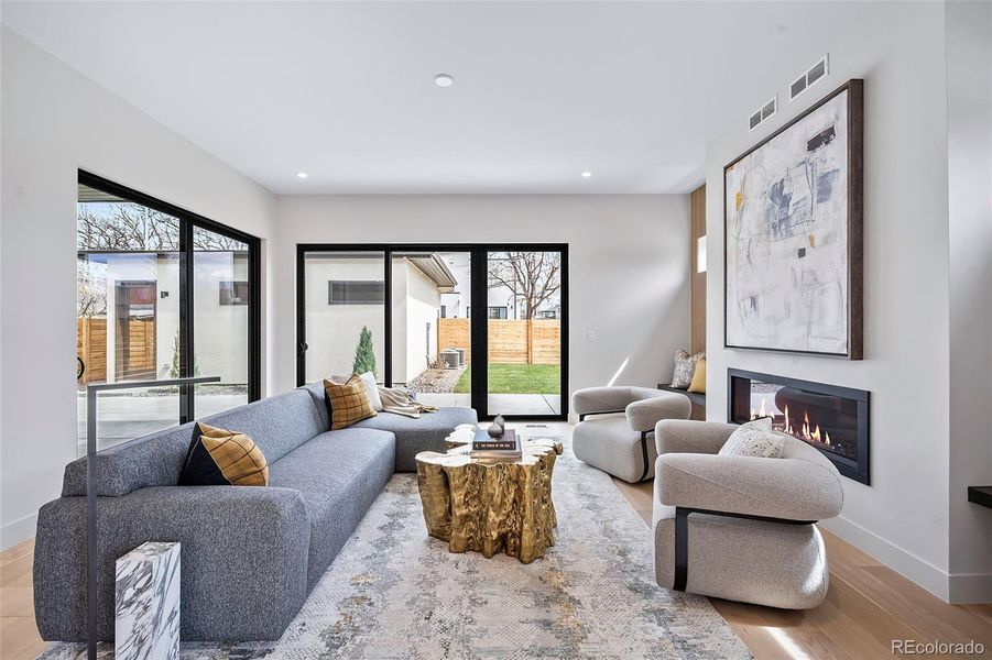 Surrounded by sliders and windows this living room stands out.